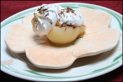 Meringue Tartlets with Pears and Shaved Chocolate